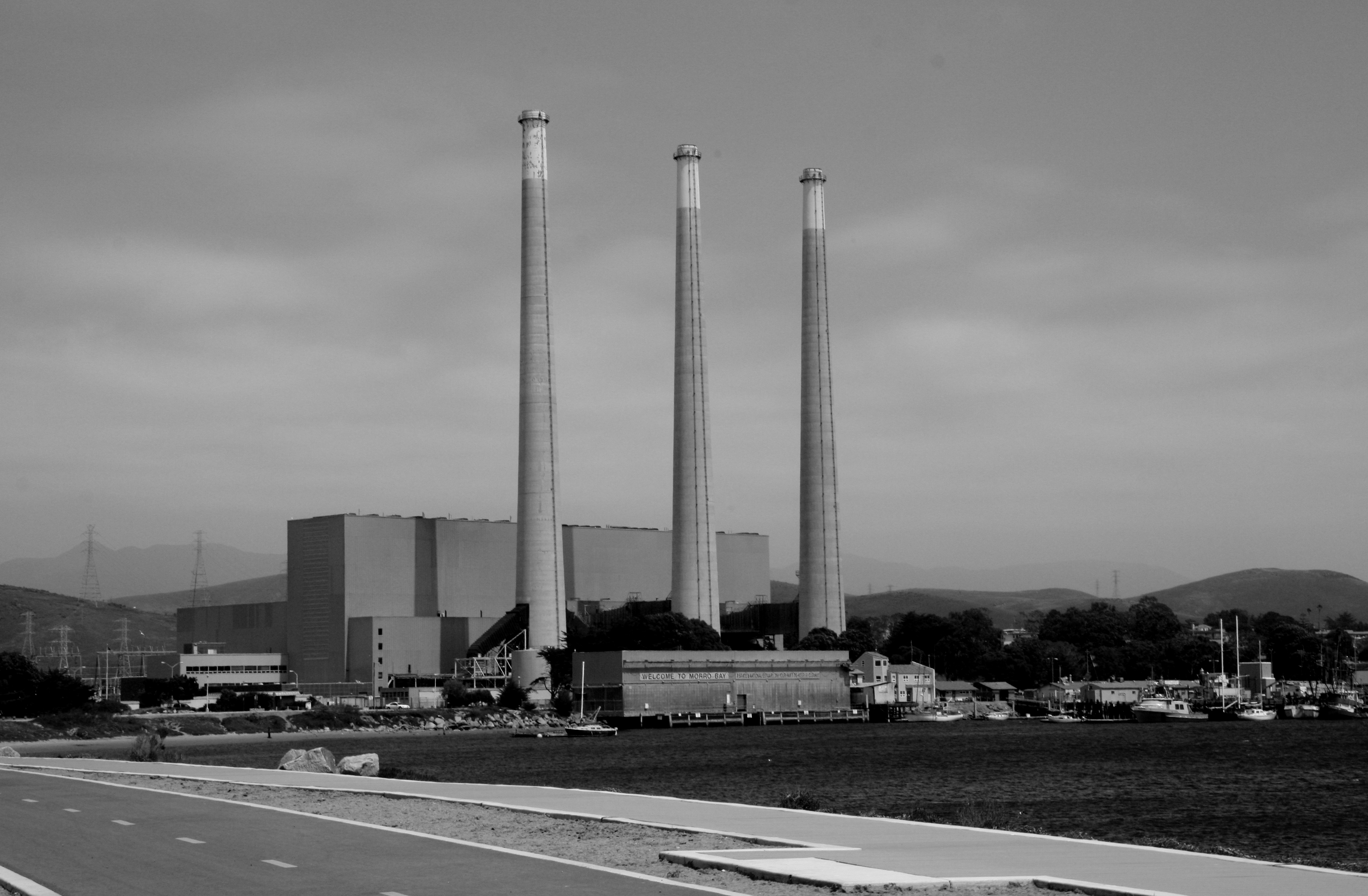 Iconic Morro Rock at sunset with coastal reflections